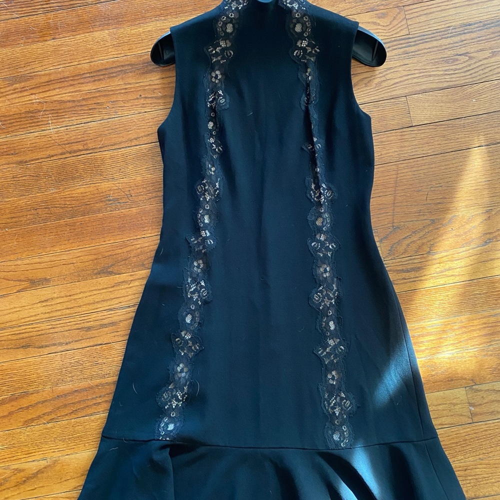 Sleeveless black crepe lace trim dress